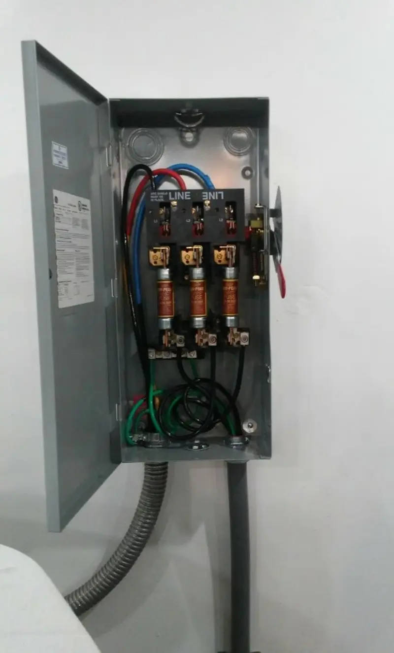 Three-phase disconnect switch installed for Smoke Detector Installation in Media